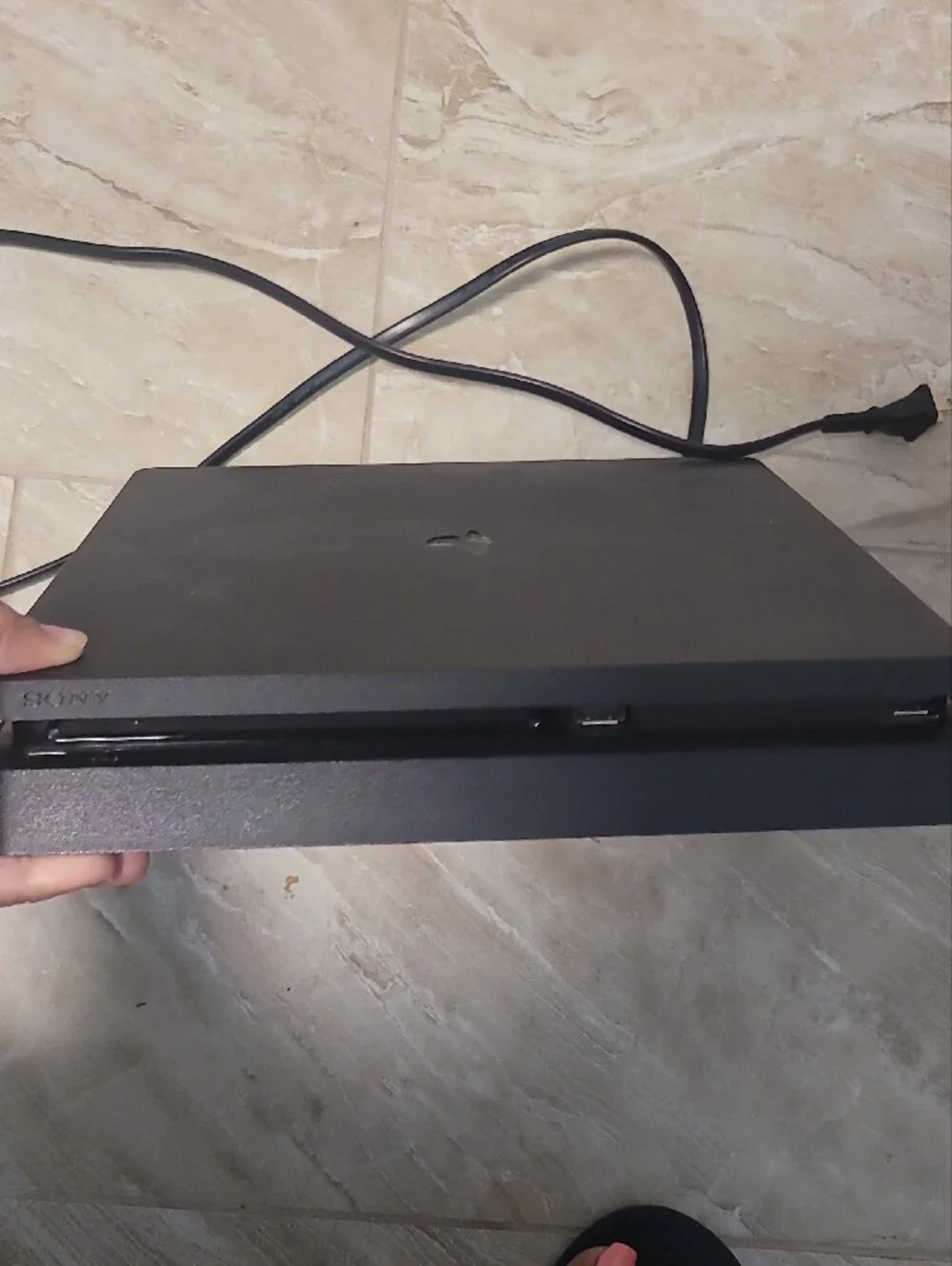 Sony Black PS4 Slim Console with Two Black DualShock Controllers